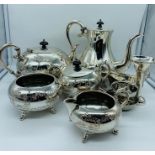 A selection of silver plated items to include a tea and coffee service.