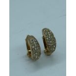 A pair of 18ct three colour gold earrings