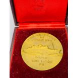 A bronze, cased medallion celebrating 'Paquebot Louis Lumiere 1952'