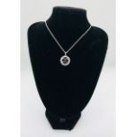 A Silver and Designer Style Pendant Necklace set With CZ's