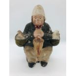 China Figure of a man holding chickens
