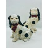 A pair of china Spaniels