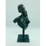 A bronze of a lady by Nicolas Lavarenne. This was an early bronze if not the first of a woman by