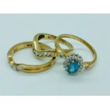 Three 9ct gold rings with various settings and stones (6.7g)