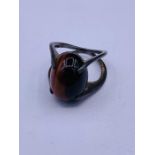 A Tigers Eye ring in a silver mount