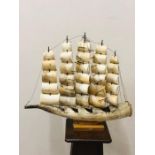 A model of a ship in horn.