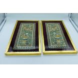 A Pair of framed Oriental silks