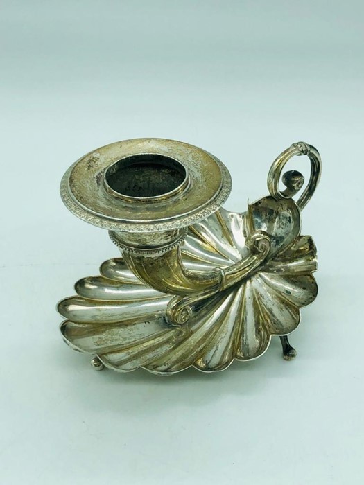 A Continental silver shell themed Chamberstick