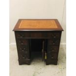 Small Tan Leather Topped lockable Desk With Three Small Drawers Each Side, One Top Drawer and a