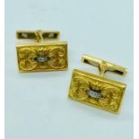 Pair of cuff links with indistinct hallmarks (17.2g)