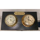 A Sestrel Marine Barometer and Ships Clock including a brass plaque 'The Captains Word is Law'