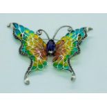 A Silver and Plique a Jour Butterfly Brooch with Amethyst Body