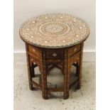 An Indian Bone Inlaid Table with Octagonal Base and Round Top