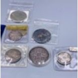 A selection of various coins Victorian florins, crowns and onwards.