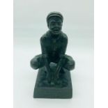 A Bronze of a cub scout, engraved 'To Rikki with grateful thanks St Gabriels Group 22.11.34