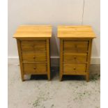 A Pair of Oak three drawer bedside cabinets