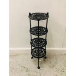 A Black Cast Iron Four Tier Pan Stand