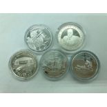 A selection of five silver proof Five Pound Coins.