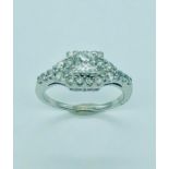 An 18ct White Gold Diamond Cluster Ring of 1ct Approx.