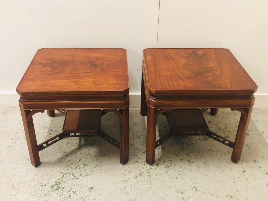 Pair of low side or lamp tables with shaped x stretcher H 50 cm x W 56 cm D 56 cm