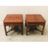 Pair of low side or lamp tables with shaped x stretcher H 50 cm x W 56 cm D 56 cm