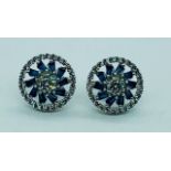 A Pair of Silver CZ and Sapphire Stud Earrings