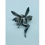 A silver Tinkerbell brooch