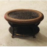 A Dark Brown wicker coffee table.