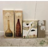 A selection of four modern canvases with a floral theme