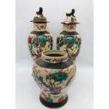 Two Chinese lidded vases (AF) along with one separate vase.1900's.