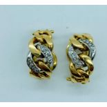 A pair of 18ct gold earrings (11.7g)