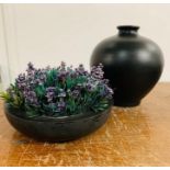 A Stoneware Black Pot with Lavender and a Globe Shaped Vase