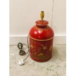 A red metal painted lamp base.