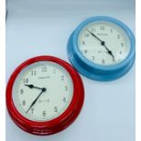 Two contemporary wall clocks by Baskerville