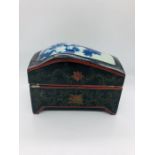 A Chinese Papier Mache box with inset porcelain lid panel (AF)