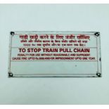 An Indian Tinplate railway sign