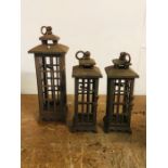 A Pair Of Cast Iron Garden Lanterns Standing 30cm Tall and a Matching Larger One Standing 38cm Tall