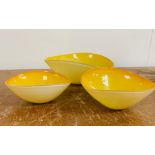 Three Yellow Glass Bowls