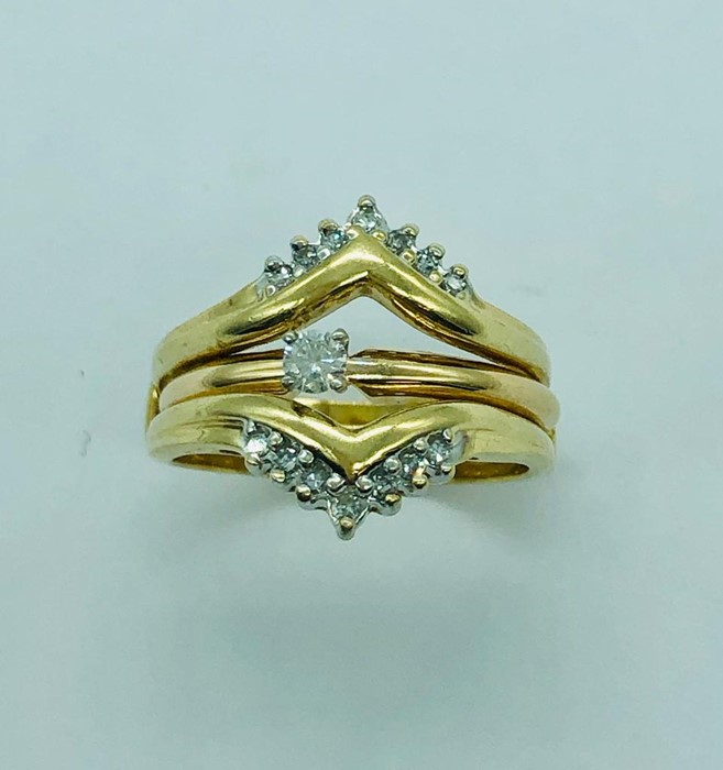 An 14ct yellow gold ring (6.8)