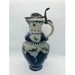 A Lidded stoneware Stein like jug
