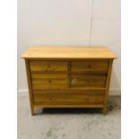 A Contemporary Oak chest of drawers, four over one, (H 88 cm x W 111 cm x D 48 cm)