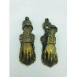 A Pair Of Brass Hand Clip Holders