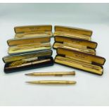 A selection of eight rolled gold pencils