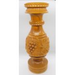 Turned Wood vase with Carved Vine Leaves and Grape Design to Centre
