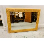 A Rectangular Mirror with a Gilt Frame