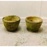 A Pair of Round Weathered Stone Planters