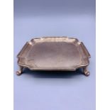 A silver four footed tray, marked Hunt & Roskell Ltd, Storr & Mortimer.