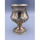A Silver chalice style cup with foliate design., makers mark EB indistinct hallmarks. Engraved A Deo
