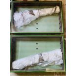 Two wall mounted display cases for diecast vehicles or similar.
