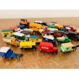 A box of thirty two diecast vehicles unboxed